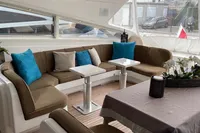 Luxurious interior of 1997 Arno Leopard 27m yacht with elegant seating and decor.