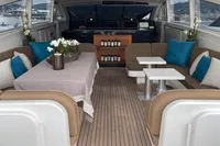 Luxurious interior of 1997 Arno Leopard 27m yacht with elegant seating and decor.