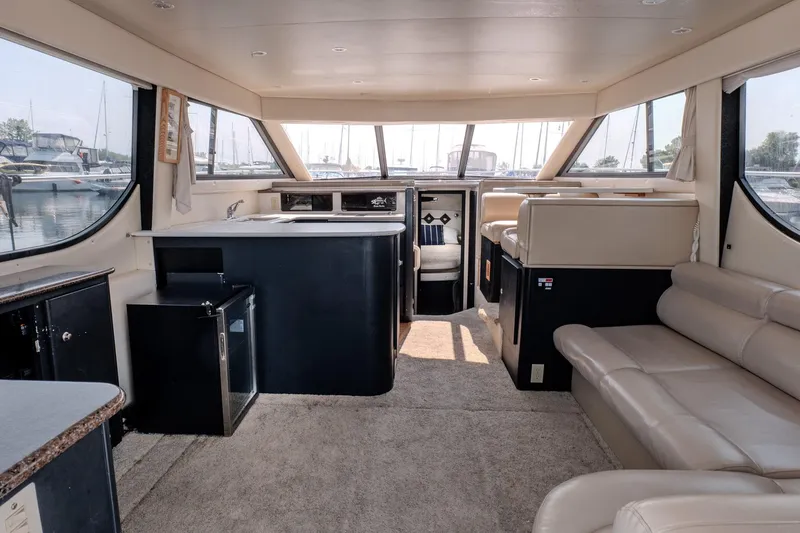  Yacht Photos Pics Interior of 2001 Bayliner 3788 Command Bridge Motoryacht with spacious seating and modern amenities.