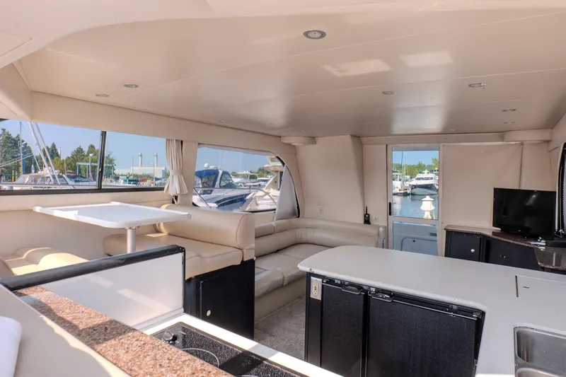  Yacht Photos Pics Interior of 2001 Bayliner 3788 Command Bridge Motoryacht with spacious seating and modern amenities.