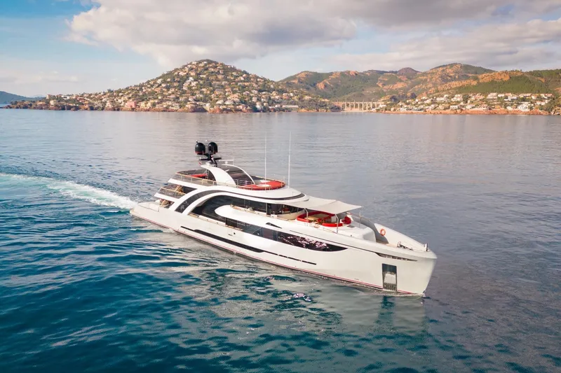 Euphoria II Yacht Photos Pics Luxurious 2016 Mayra Yachts 50m cruising near scenic coastal landscape.