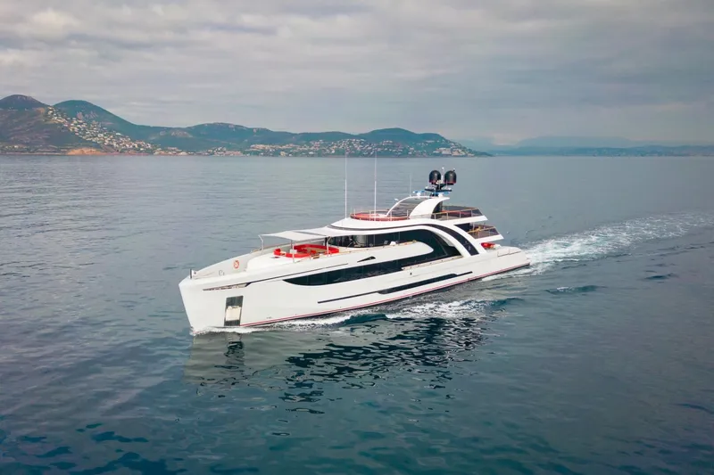 Euphoria II Yacht Photos Pics Luxurious 2016 Mayra Yachts 50m cruising on serene waters with scenic mountain backdrop.