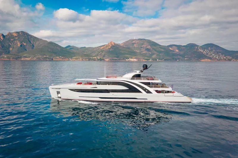 Euphoria II Yacht Photos Pics Luxurious 2016 Mayra Yachts 50m cruising on serene waters with scenic mountain backdrop.