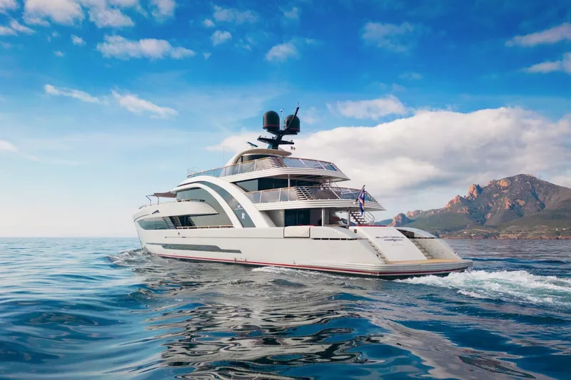 Euphoria II Yacht Photos Pics Luxurious 2016 Mayra Yachts 50m cruising on serene waters with scenic mountain backdrop.