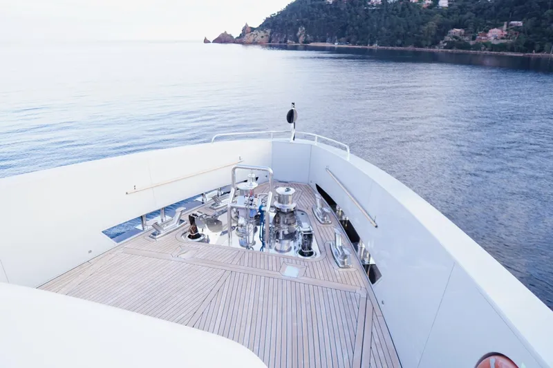 Euphoria II Yacht Photos Pics Bow view of 2016 Mayra Yachts 50m, featuring sleek deck design and serene ocean backdrop.