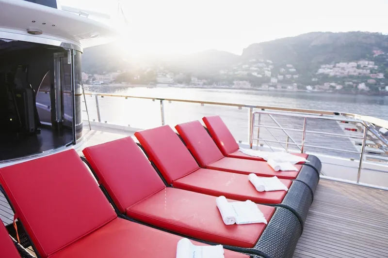 Euphoria II Yacht Photos Pics Luxurious Mayra Yachts 50m deck with red loungers, scenic ocean view, 2016 model.