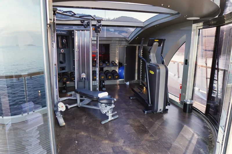 Euphoria II Yacht Photos Pics Luxurious gym on Mayra Yachts 50m, 2016 model, with ocean view and modern equipment.