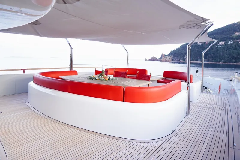 Euphoria II Yacht Photos Pics Luxurious Mayra Yachts 50m deck with red seating, 2016 model, scenic ocean view.