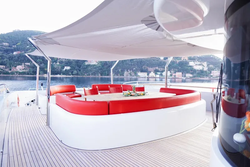 Euphoria II Yacht Photos Pics Luxurious Mayra Yachts 50m deck with red seating, scenic waterfront view, 2016 model.