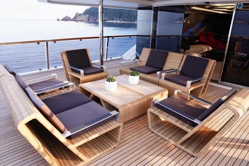 Euphoria II Yacht Photos Pics Luxurious deck seating on 2016 Mayra Yachts 50m, overlooking serene ocean view.