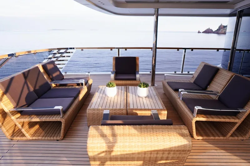 Euphoria II Yacht Photos Pics Luxurious deck seating on 2016 Mayra Yachts 50m, overlooking serene ocean view.