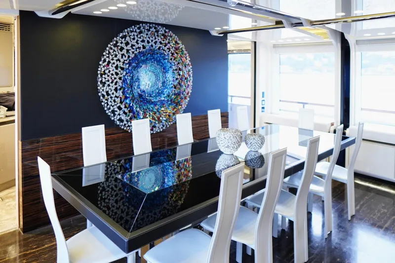 Euphoria II Yacht Photos Pics Luxurious dining area on 2016 Mayra Yachts 50m, featuring modern decor and elegant seating.