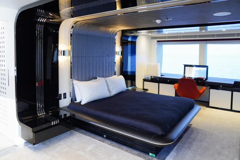 Euphoria II Yacht Photos Pics Luxurious bedroom interior on 2016 Mayra Yachts 50m, featuring modern design and ocean view.
