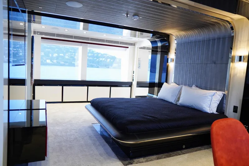 Euphoria II Yacht Photos Pics Luxurious bedroom interior on 2016 Mayra Yachts 50m, featuring modern design and large windows.