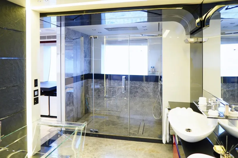 Euphoria II Yacht Photos Pics Luxurious bathroom interior on a 2016 Mayra Yachts 50m, featuring modern glass shower.