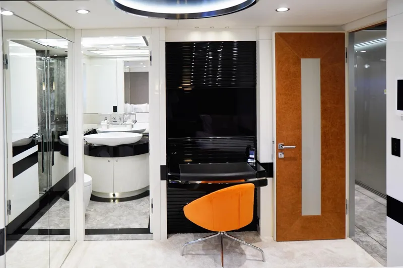 Euphoria II Yacht Photos Pics Luxurious Mayra Yachts 50m interior, featuring modern design with orange chair and sleek bathroom.