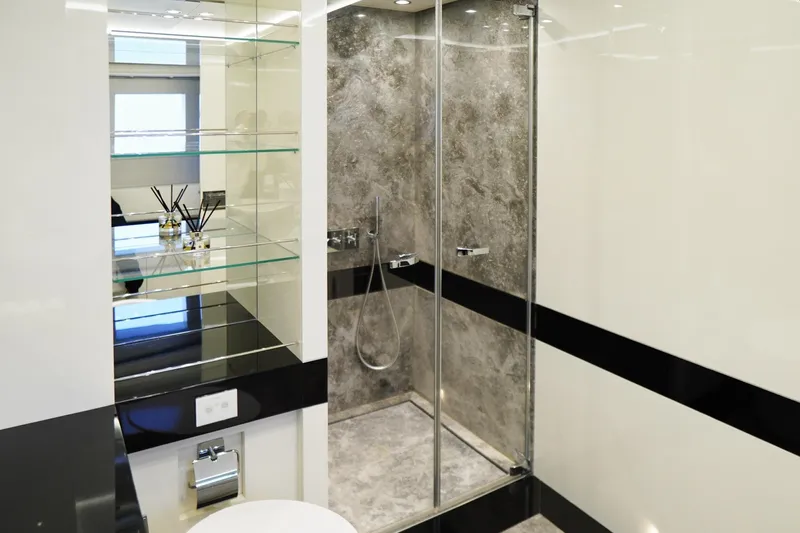 Euphoria II Yacht Photos Pics Luxurious bathroom on 2016 Mayra Yachts 50m, featuring glass shelves and modern shower.