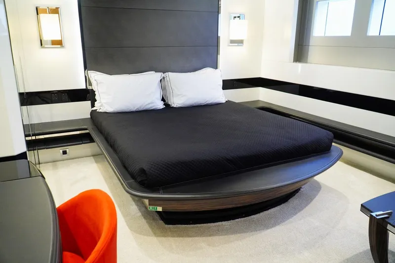 Euphoria II Yacht Photos Pics Luxurious bedroom interior on 2016 Mayra Yachts 50m, featuring modern design and elegant furnishings.