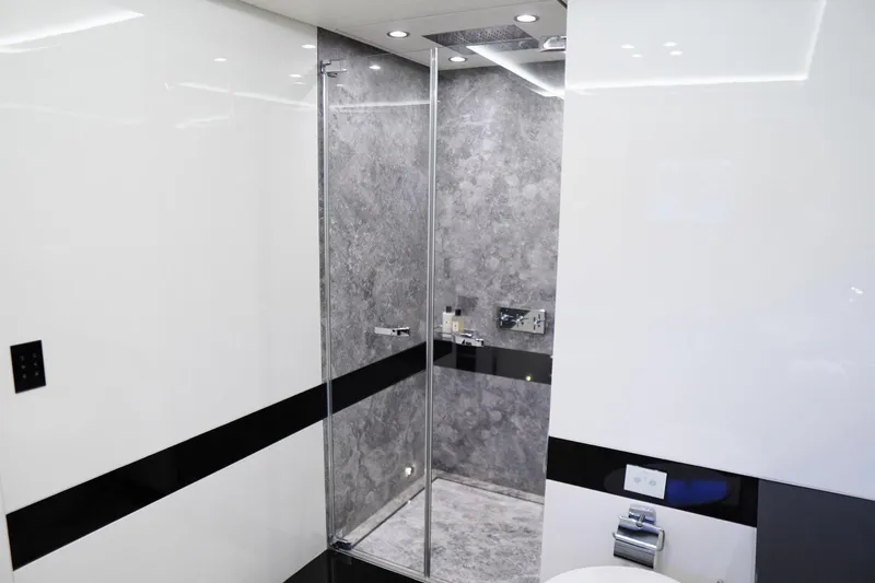 Euphoria II Yacht Photos Pics Luxurious bathroom on 2016 Mayra Yachts 50m, featuring sleek modern design and elegant finishes.