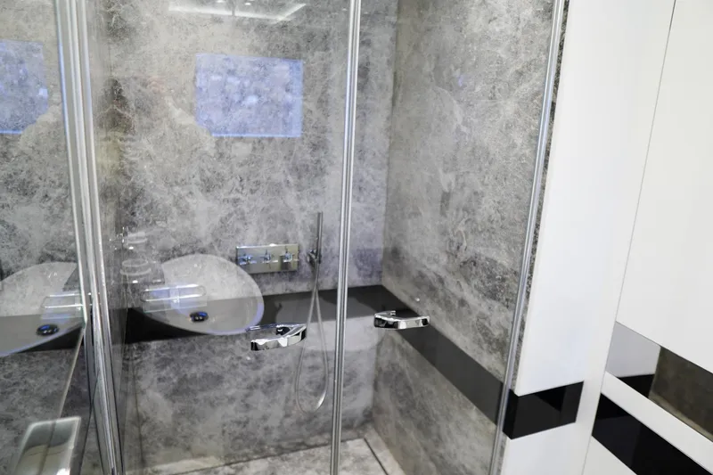 Euphoria II Yacht Photos Pics Luxurious bathroom with marble walls on Mayra Yachts 50m, 2016 model.