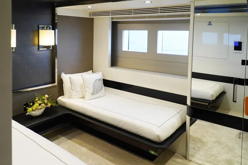 Euphoria II Yacht Photos Pics Luxurious interior of 2016 Mayra Yachts 50m, featuring elegant bedding and modern design.