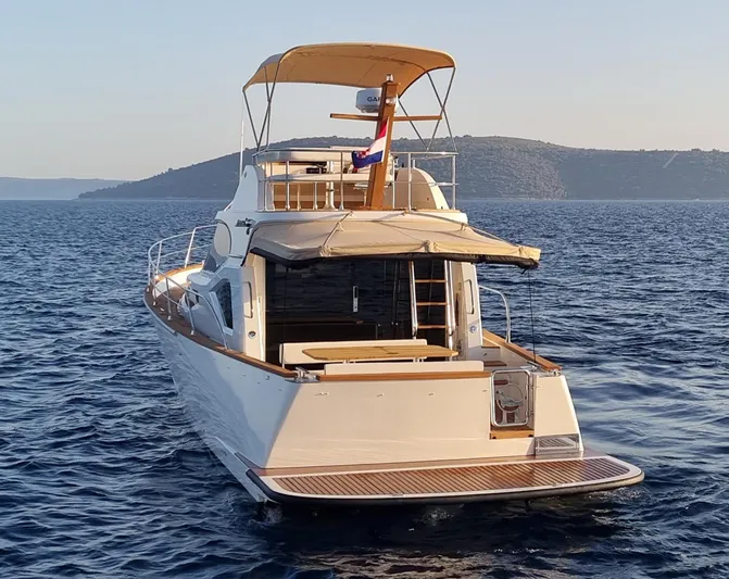 Monachus 470 Fly Yacht Photos Pics Luxury Monachus 470 FLY yacht cruising on open sea, 2026 model.