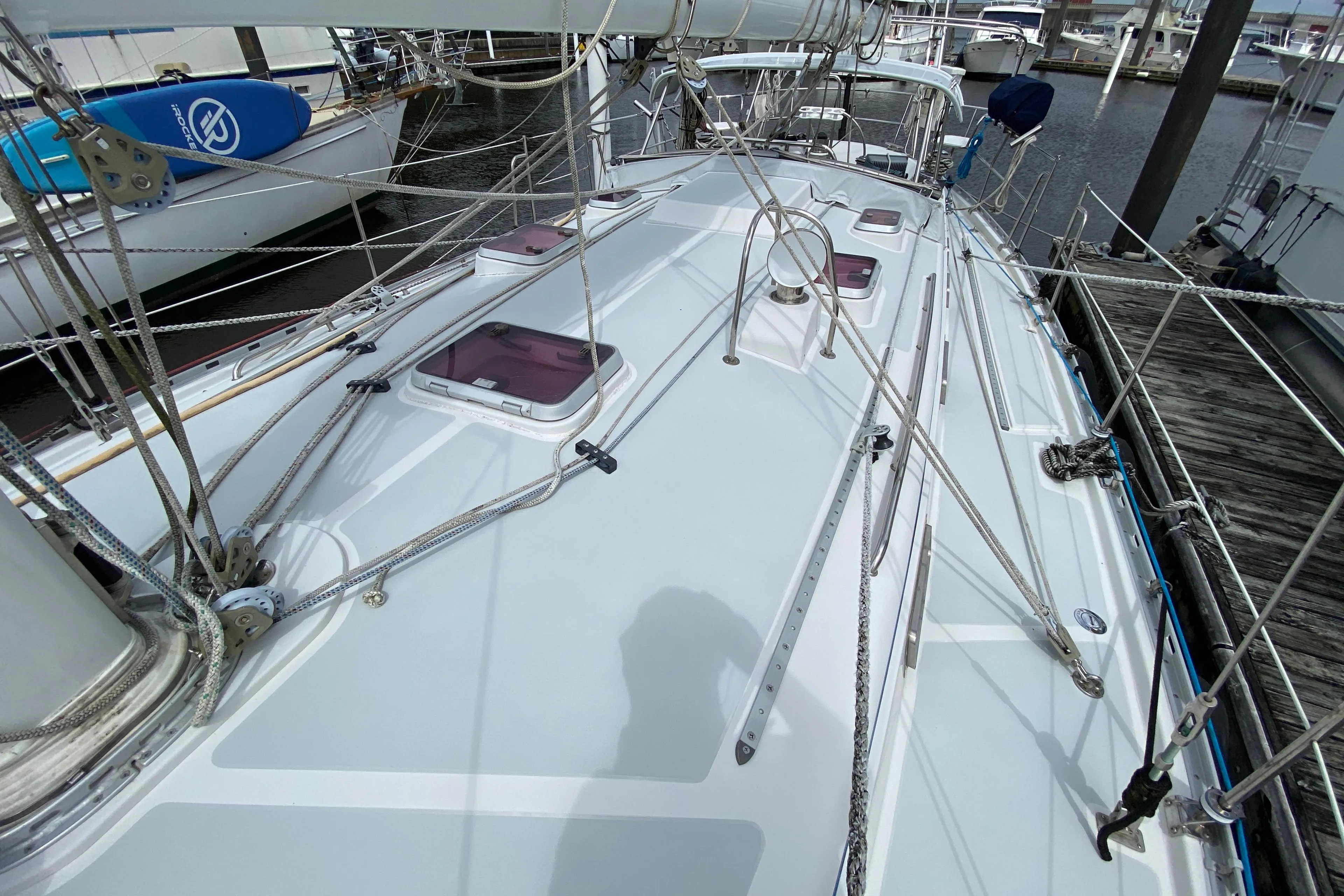 Deck view of a 2007 Valiant 50 sailboat, showcasing rigging and hatches.