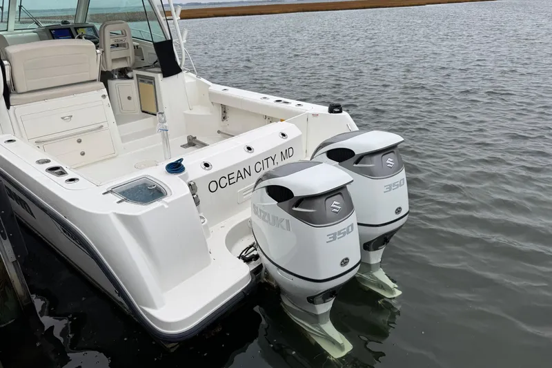 Hammer Down Yacht Photos Pics 2016 Boston Whaler 315 Conquest with twin Suzuki 350 engines, docked in Ocean City, MD.
