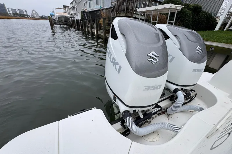 Hammer Down Yacht Photos Pics Twin Suzuki 350 outboard engines on a 2016 Boston Whaler 315 Conquest boat.