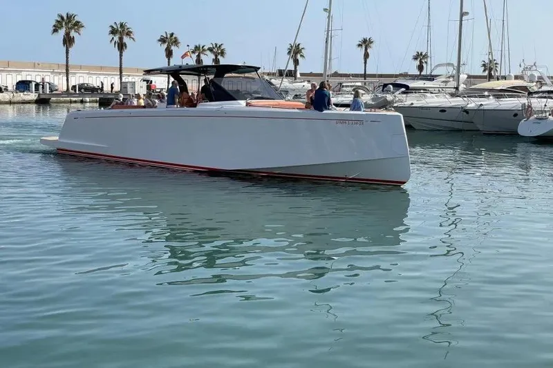 Ban Ban Yacht Photos Pics 2023 Pardo Yachts 50 in marina, surrounded by palm trees and other boats.