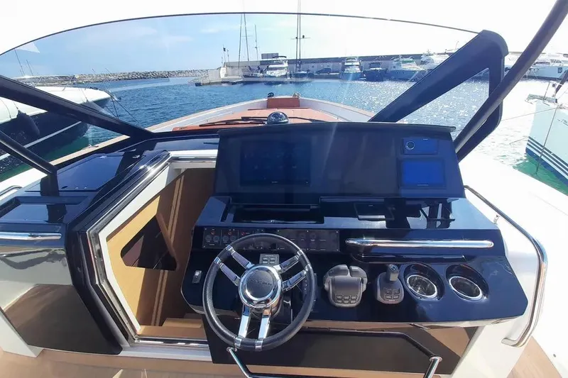 Ban Ban Yacht Photos Pics Helm of 2023 Pardo Yachts 50, featuring modern controls and sleek design.