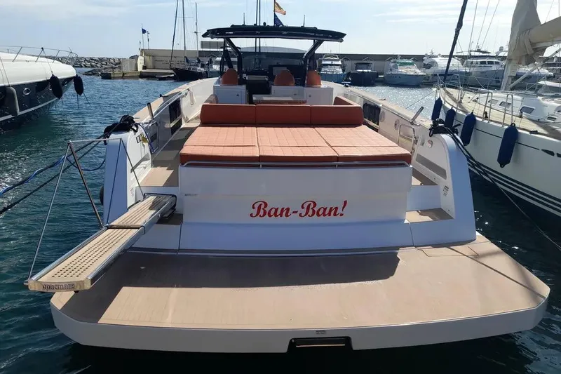 Ban Ban Yacht Photos Pics 2023 Pardo Yachts 50 docked, featuring spacious deck and seating area.
