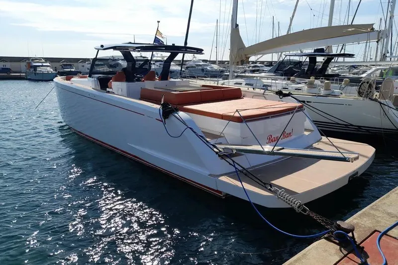 Ban Ban Yacht Photos Pics 2023 Pardo Yachts 50 docked in a marina, showcasing sleek design and luxury features.