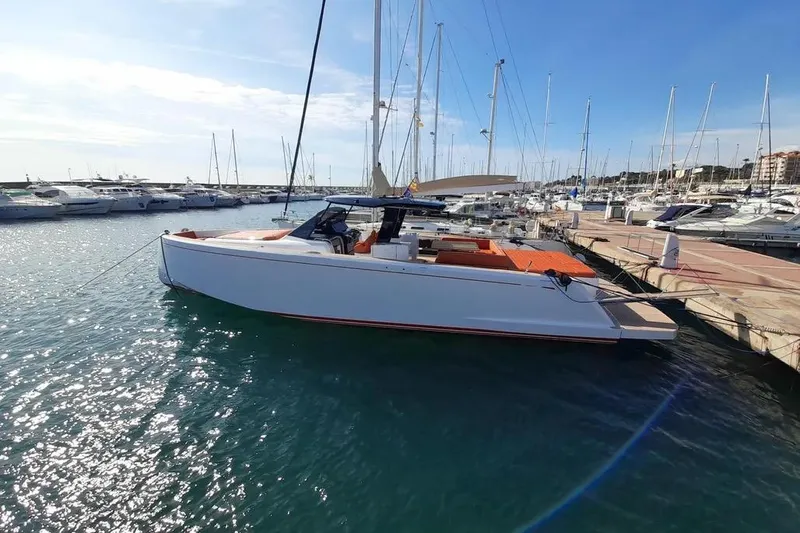 Ban Ban Yacht Photos Pics 2023 Pardo Yachts 50 docked in a marina under a clear blue sky.