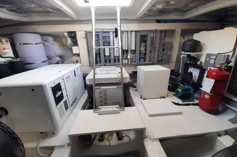 Ban Ban Yacht Photos Pics Engine room of 2023 Pardo Yachts 50, featuring equipment and control panels.