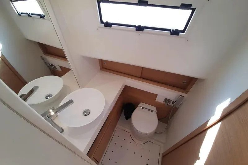 Ban Ban Yacht Photos Pics Modern bathroom in 2023 Pardo Yachts 50, featuring sleek sink and toilet design.