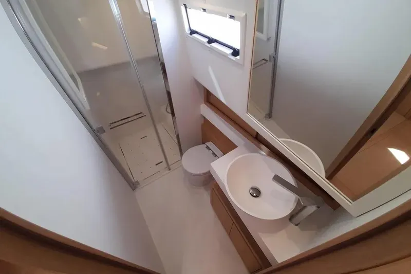 Ban Ban Yacht Photos Pics Modern bathroom interior on 2023 Pardo Yachts 50, featuring sleek sink and shower.