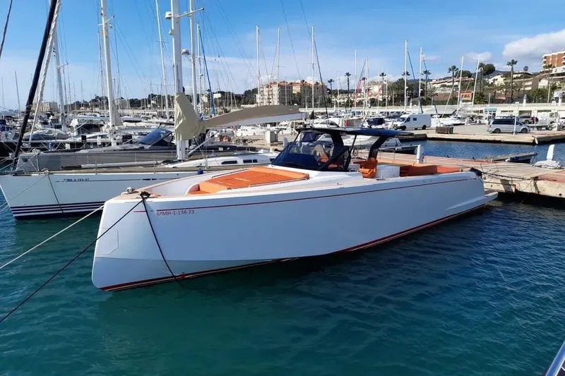 Ban Ban Yacht Photos Pics 2023 Pardo Yachts 50 docked in a marina, showcasing sleek design and luxury features.