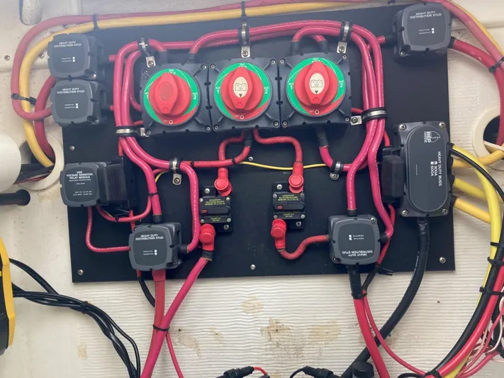Susan Dee Yacht Photos Pics Electrical panel with red and yellow cables on a 2007 Jarrett Bay Walkaround boat.