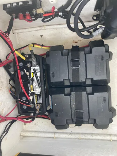 Susan Dee Yacht Photos Pics Battery compartment of a 2007 Jarrett Bay Walkaround boat with wiring and connections.