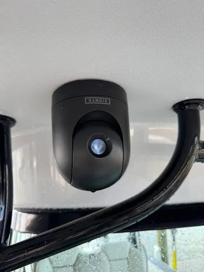 Nauti Time Yacht Photos Pics 2024 World Cat 325 CC boat with mounted security camera on ceiling.