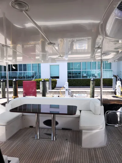  Yacht Photos Pics 2014 Azimut Flybridge yacht with sleek interior and modern dockside view.