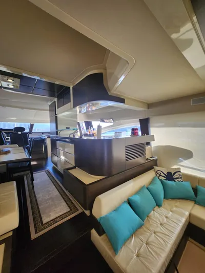  Yacht Photos Pics Luxurious interior of a 2014 Azimut Flybridge yacht with modern furnishings and elegant design.