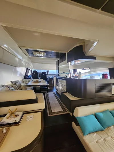  Yacht Photos Pics Luxurious interior of a 2014 Azimut Flybridge yacht with modern furnishings and elegant design.