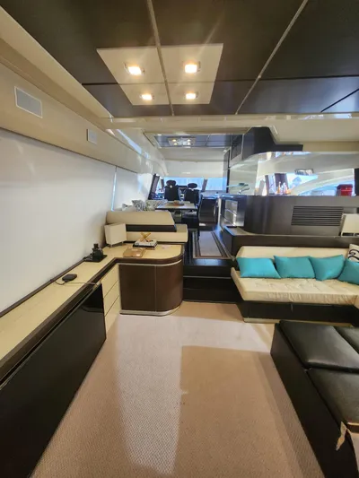  Yacht Photos Pics Luxurious interior of a 2014 Azimut Flybridge yacht with modern furnishings and elegant design.