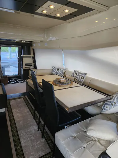  Yacht Photos Pics Luxurious interior of a 2014 Azimut Flybridge yacht with elegant seating and modern decor.