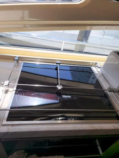  Yacht Photos Pics Stovetop on 2014 Azimut Flybridge yacht, featuring sleek design and modern amenities.