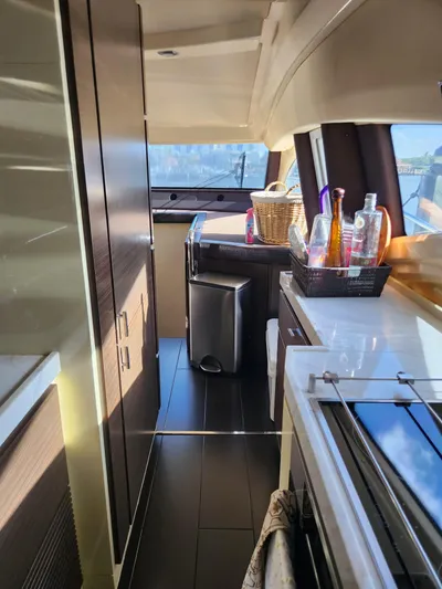  Yacht Photos Pics Interior of 2014 Azimut Flybridge yacht with modern kitchen and sleek design.