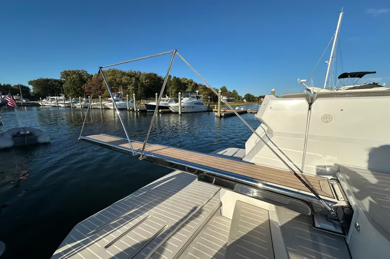 Bellisima Yacht Photos Pics 2019 Azimut Atlantis 51 yacht with extended gangway at marina.