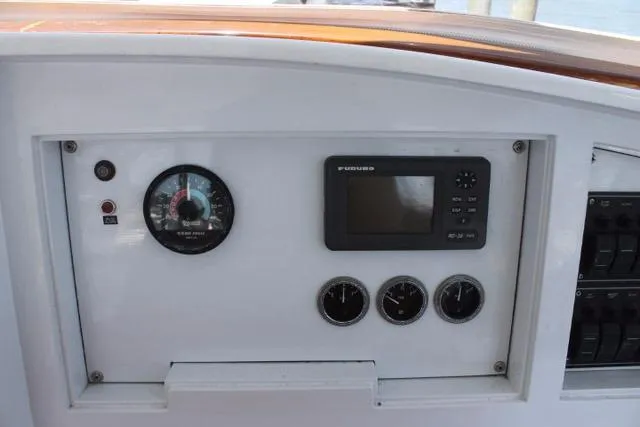 M.a.c. Daddy Yacht Photos Pics Control panel of 2005 Custom DeSanti Carolina Express boat with gauges and display.